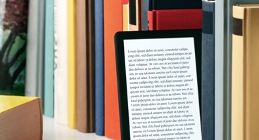 This image shows books and a tablet. 
The image was used for a flyer (LE RDI Open House Event Flyer) that described the LE library and information services.